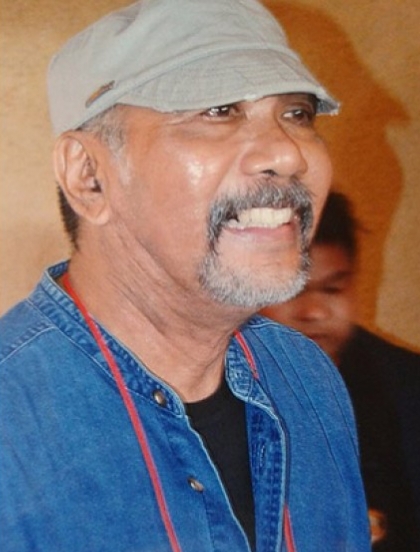 Yesmil Anwar, S.H., M.Si.