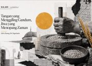 tangan yang menggiling gandum